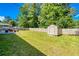 Large backyard with a storage shed, ideal for outdoor activities and gardening at 2462 Pate S St, Snellville, GA 30078