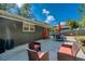 Cozy patio with comfortable seating, ideal for enjoying the outdoor space and tranquil backyard at 2462 Pate S St, Snellville, GA 30078