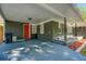 Home with a covered porch and well-maintained landscaping, creating a welcoming entrance at 2462 Pate S St, Snellville, GA 30078