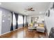 Bright living room with hardwood floors, modern furniture, and plenty of natural light at 2462 Pate S St, Snellville, GA 30078
