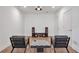 Finished basement with speakers, a seating area, hardwood floors, and recessed lighting at 4505 Caroline Walk, Dunwoody, GA 30338