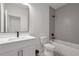 Modern bathroom featuring vanity with sink, white cabinets, and a shower-tub combo at 4505 Caroline Walk, Dunwoody, GA 30338