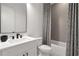 Stylish bathroom featuring modern fixtures, a sleek vanity, and a shower with elegant tile at 4505 Caroline Walk, Dunwoody, GA 30338