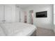 Cozy bedroom with plush carpet, ample closet space, and a minimalist design at 4505 Caroline Walk, Dunwoody, GA 30338