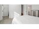 Bright bedroom features a walk-in closet, carpet floors, and an ensuite bathroom at 4505 Caroline Walk, Dunwoody, GA 30338