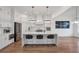 Well-lit kitchen with an island, modern appliances, and hardwood flooring at 4505 Caroline Walk, Dunwoody, GA 30338