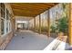 Expansive covered patio with views of the wooded backyard, perfect for outdoor entertaining and relaxation at 4505 Caroline Walk, Dunwoody, GA 30338