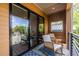 Stylish balcony with rocking chairs, offering a cozy outdoor living space with scenic views at 112 Rogers St # 208, Atlanta, GA 30317