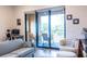 View of the balcony with outdoor seating adjacent to the living room and work station at 112 Rogers St # 208, Atlanta, GA 30317