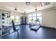Well-equipped gym with modern exercise equipment and plenty of natural light at 112 Rogers St # 208, Atlanta, GA 30317