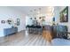 Contemporary kitchen featuring modern cabinets, an island with seating, and light wood flooring at 112 Rogers St # 208, Atlanta, GA 30317