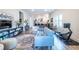 Bright, open-concept living area with modern furnishings and sleek hardwood floors at 112 Rogers St # 208, Atlanta, GA 30317