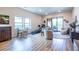Bright living room with natural light, hardwood floors, and a sliding door to balcony at 112 Rogers St # 208, Atlanta, GA 30317