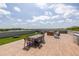 Beautiful rooftop deck perfect for entertaining with dining and lounging areas and gorgeous views at 112 Rogers St # 208, Atlanta, GA 30317