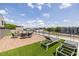 Enjoy outdoor living on this rooftop deck featuring comfortable seating and lush green turf at 112 Rogers St # 208, Atlanta, GA 30317