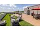 Relax on the rooftop patio, featuring an outdoor grill, seating, and artificial turf for a great entertainment space at 112 Rogers St # 208, Atlanta, GA 30317
