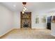 Inviting living room features a cozy stone fireplace and lots of light at 1350 Overlook Se Cv, Smyrna, GA 30080
