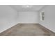 Bedroom with carpet and natural light from the window at 4457 Huntshire Dr, Stone Mountain, GA 30083