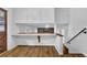 Breakfast nook with wood flooring and open to living area at 4457 Huntshire Dr, Stone Mountain, GA 30083