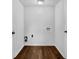 Laundry room with hardwood floors at 4457 Huntshire Dr, Stone Mountain, GA 30083