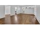 Spacious living room with hardwood floors and natural light at 4457 Huntshire Dr, Stone Mountain, GA 30083