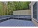 Spacious back deck with built-in seating, ideal for entertaining and enjoying the outdoors at 11 Ardmore Nw Sq, Atlanta, GA 30309