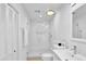 Modern bathroom featuring a walk-in shower, clean white tile, and modern fixtures at 11 Ardmore Nw Sq, Atlanta, GA 30309