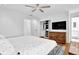Bright main bedroom with wood floors, walk-in closet, and dresser at 11 Ardmore Nw Sq, Atlanta, GA 30309