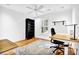 Bright office area featuring hardwood floors, white walls, natural light, and simple decor at 11 Ardmore Nw Sq, Atlanta, GA 30309