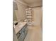 Well-lit bathroom showcasing a vanity with drawers and a shower with curtain at 129 Carolyn Path, Rockmart, GA 30153