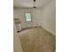 Eat-in kitchen area featuring a back door, perfect for enjoying indoor and outdoor living at 129 Carolyn Path, Rockmart, GA 30153