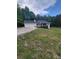 Charming home with a two-car garage and a lush yard at 129 Carolyn Path, Rockmart, GA 30153