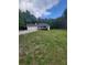 Inviting home with an attached two car garage and front deck at 129 Carolyn Path, Rockmart, GA 30153