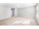 Spacious bedroom with neutral walls and carpet, natural light and ample space for customization at 2769 Morgan Spring Trl, Buford, GA 30519
