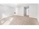 Empty bedroom with neutral walls, carpet and windows that provide ample sunlight at 2769 Morgan Spring Trl, Buford, GA 30519