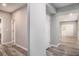 Neutral hallway that connects different areas of the home, showcasing the layout and flow at 2769 Morgan Spring Trl, Buford, GA 30519