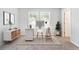 Home office area with white desk and natural light, perfect for remote work at 2769 Morgan Spring Trl, Buford, GA 30519