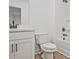Bright bathroom with a vanity sink and a shower and bathtub combination at 4663 Larkfield Way, Powder Springs, GA 30127