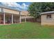 Well-maintained backyard with a storage shed, offering ample space for outdoor activities and storage at 5645 Carrington Pl, Cumming, GA 30040