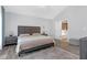 Bright main bedroom offers natural light and ensuite bath access at 5645 Carrington Pl, Cumming, GA 30040