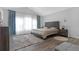 Spacious bedroom with vaulted ceilings and large windows that provide natural light at 5645 Carrington Pl, Cumming, GA 30040