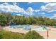 Community pool with a splash pad and water slide, providing fun for all ages at 5645 Carrington Pl, Cumming, GA 30040