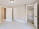 Bright and airy bedroom featuring clean floors, fresh paint, and access to other rooms at 971 Sims Nw Ave, Atlanta, GA 30318