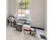Simple bedroom presents neutral walls, a window, and an unfinished floor at 971 Sims Nw Ave, Atlanta, GA 30318