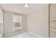 Bright and airy bedroom featuring clean floors, fresh paint, a window and a closet at 971 Sims Nw Ave, Atlanta, GA 30318