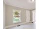 Bright living room featuring clean floors, large windows, and freshly painted walls at 971 Sims Nw Ave, Atlanta, GA 30318