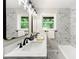 Updated bathroom with marble tiled walls, dual windows for natural light, and a modern vanity at 2125 Lynn Sw Dr, Marietta, GA 30060