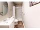 Bathroom featuring a new vanity with a round mirror, toilet, and shower with a curtain at 271 Leafwood Ln, Riverdale, GA 30274