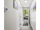 Freshly painted hallway with wood-look floors and modern decor at 271 Leafwood Ln, Riverdale, GA 30274