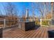 A wide shot of the back deck area, with entertaining space and views of the backyard at 1018 Jubilee Way, Powder Springs, GA 30127